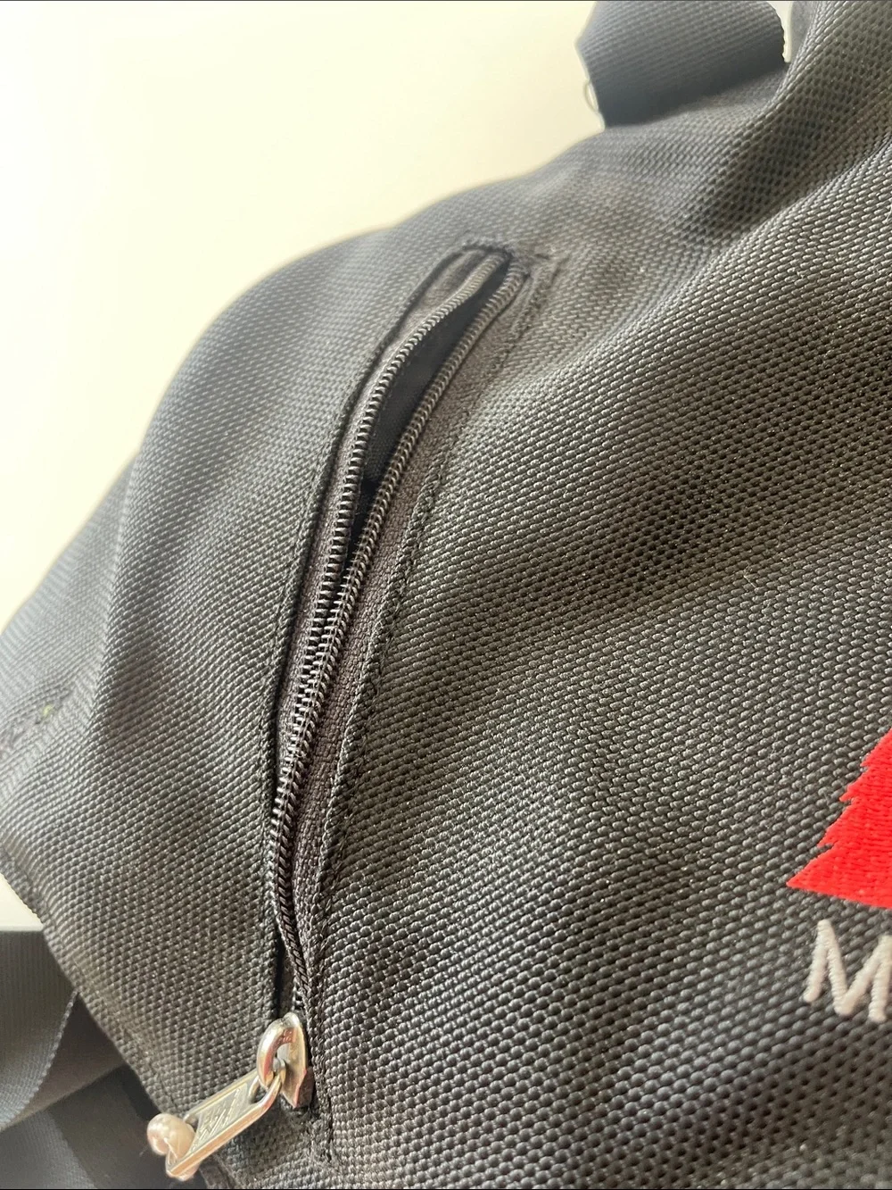 REI Muaette Black and Red Messenger Bag